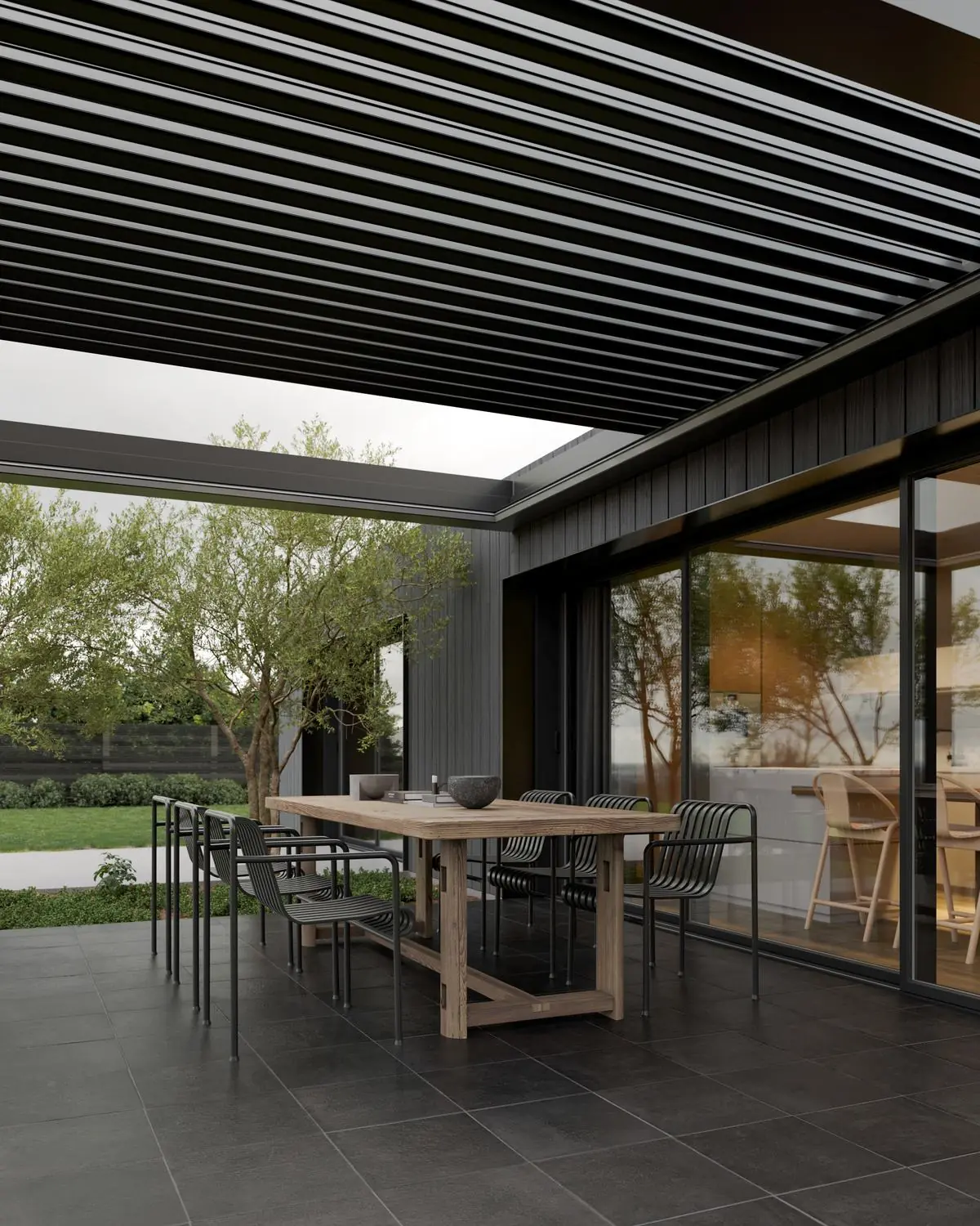 Bioklimatik pergola altında bahçe yemek masası